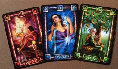 The 3 of Wands, 2 of Swords & 6 of Coins from The Tarot of Dreams by Ciro Marchetti.