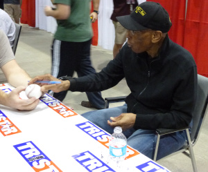 Ernie just having signed my baseball.