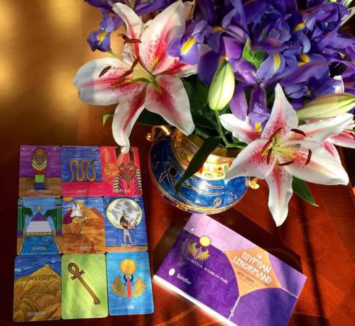 The Egyptian Lenormand (Schiffer Books, 2015), copyright Nefer Khepri 2012 & 2015; copyright Schiffer Books, 2015). Featuring left to right: Sarcophagus, Snake, Desert Fox, Garden, Rider, Moon, Mountain, Key, Sun, & 176-page guidebook.