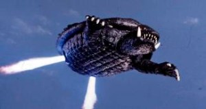 Gamera using his jet rockets to fly through the air.