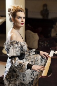 Victorian woman playing the piano. Image by Patrisyu. Image # 100265938 at freedigitalphotos.net